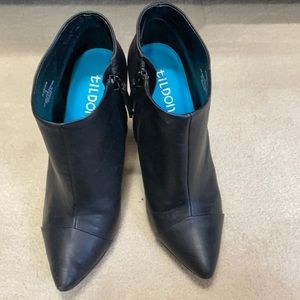 Black leather booties with lucite heel